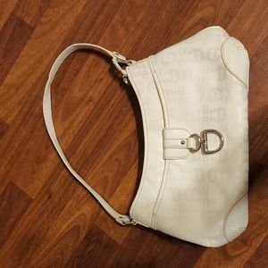 Aigner winter white handbag. Has several pockets. In very good condition.